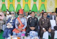 Kapolres Kotamobagu saat menghadiri HUT Kotamobagu