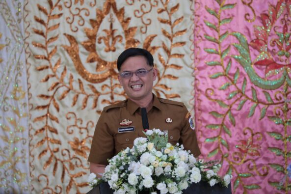 Sahaya Mokoginta saat menyampaikan Sambutan Wali Kota Kotamobagu Foto Istimewa