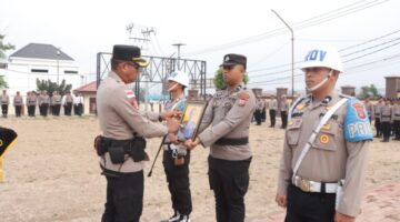 Kapolres Kotamobagu AKBP Abdul Kholik Pimpin Upacara PDTH Aiptu Fahri